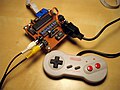 UzeBox with SNES controller.