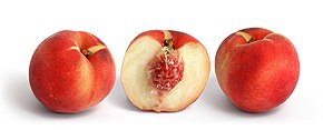 White peach of the clingstone variety White peach and cross section edit.jpg