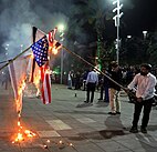 US and Israel flags burned in Iran in support of the October 7 Hamas attack