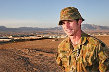 Australian soldier wearing a giggle hat, Afghanistan, 2013 Australian Army Maj. Christopher Sampson, a military engineer, poses for a photo Nov. 20, 2013, at Multinational Base Tirin Kot, Afghanistan 131120-O-ZZ999-024-AU.jpg