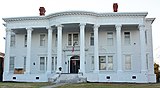 Hubble House, a mansion with Corinthian columned portico on College St. between Walnut and Georgia Sts.