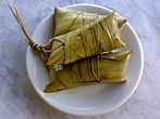 Suman sa ibus, a type of suman, steamed glutinous rice packaged in tagbak leaves