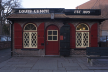 Louis' Lunch, where the hamburger was reputedly invented in 1900 Louis-lunch.png