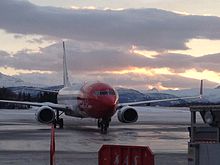 Norwegian Air Shuttle Boeing 737-800 at the airport Norwegian Air Shuttle Boeing 787-800 (12273094113).jpg