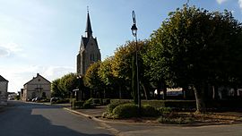The church and surroundings in Thiville
