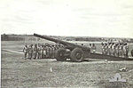 Armistice day service beside 155mm heavy gun at Fort Lytton 11 Nov 1943.