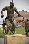 USMC Sgt. does box jumps during the Commanding General's Fitness Cup Challenge at MCRDPI 2016