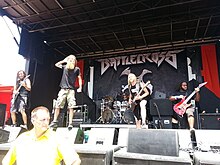 Talley performing at Mayhem Festival in Dallas, Texas with American heavy metal band Battlecross