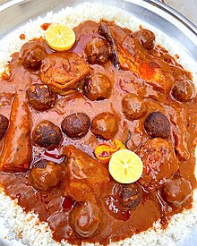 Senegalese domoda with fishballs served with rice