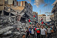 Palestinian protesters in the Gaza Strip during the 2023 Israel-Hamas war Fars Photo of Destruction in Gaza Strip during 2023 War 01.jpg