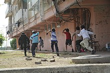 Children from the Israeli town of Kiryat Malachi running for shelter as rockets are fired from Gaza during Operation Pillar of Defense Flickr - Israel Defense Forces - Children in Town Under Fire by Rockets from Gaza (2).jpg