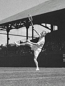 Harry Hopman hitting an overhead in the 1930s