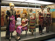 Indonesia Museum depicting traditional dresses of Indonesia. The picture shows the traditional wedding dress of Bali (left) and East Java (right) with other dresses from other provinces depicted in the background Indonesia Museum Traditional Dress 01.jpg