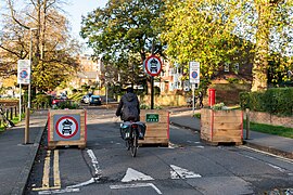 A trial modal filter using easily moved planters in London.