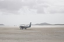 Barra Airport is the only airport in the world to use a tidal beach as its runway Twin Otter at Barra Airport.JPG