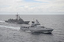 KDB Darulaman (08) leads USS Rodney M. Davis during CARAT 2014.