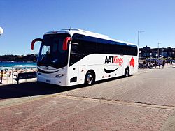 AAT Kings coach in 2013 livery at Bondi Beach.JPG