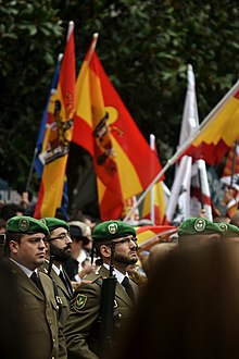 An army parade in Granada attended by far-right sympathizers who are waving the Francoist flags (2 January 2016) Dia de la Toma (no a la Toma).jpg