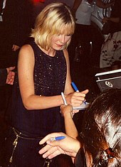 Dunst signing autographs at the Toronto International Film Festival, 2005