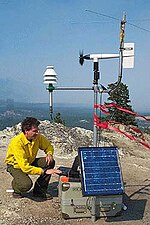 NWS IMET Chris Gibson taking observations in the field. NWS-IMET-deployed.jpg