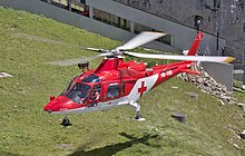 Agusta A109 K2 of the Rega over Mount Pilatus Pilatus Agusta A109 schwebend.jpg