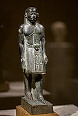 Statuetă a lui Taitai; 1380-1300 î.Hr.; greywacke; înălțime: 27,5 cm; Muzeul Egiptean din Berlin