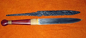 The remains of a seax together with a reconstructed replica Seax with replica.jpg
