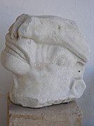Tête de taureau (ou de veau) attaqué par un lion (A1184). IIe siècle av. J.-C.