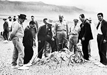Major General Leslie Groves and Robert Oppenheimer at the Trinity test site in 1945 Trinity Test - Oppenheimer and Groves at Ground Zero 001.jpg