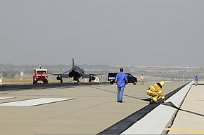 U.S. Airmen assigned to the 39th Operations Squadron and the 39th Civil Engineer Squadron inspect cables on a BAK-12 aircraft arresting barrier system Feb. 24, 2014, at Incirlik Air Base, Turkey 140224-F-IM659-149.jpg
