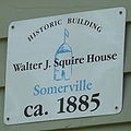 The historical marker sign on the face of the House at 10 Arlington Street