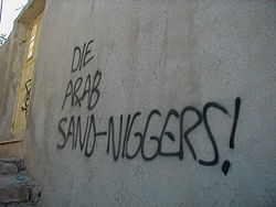 Graffiti reading "Die Arab Sand-Niggers!" reportedly sprayed by settlers on a house in Hebron. 02 05 03 Die Arab Sand.jpg