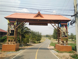 Gateway over entry road to Ban Fai