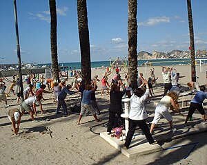 English: exercising on Benidorm beach