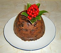 This Christmas pudding is decorated with skimmia rather than holly.