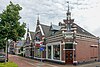 Blokje van vier (winkel)woonhuizen