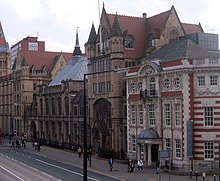Oxford Road frontage of the Manchester Museum (the Baroque style building in the foreground is the former Dental Hospital) Manchester Museum.jpg
