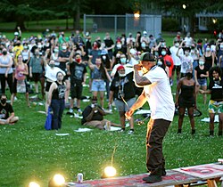 Mic Crenshaw, depicted in later life. Along with Kieran Knutson and Jason "Gator" Nevilles, he was one of the founding members of ARA from the earliest Minneapolis Baldies days. Mic Crenshaw performing at Black Lives Matter demonstration in Portland, Oregon.jpg