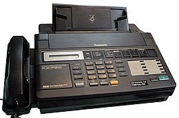 Like many fax machines, this 1990 model used thermal printing on relatively expensive thermal paper which came in rolls. The roll was inserted into a compartment in the machine. Panasonic KX-F90.jpg