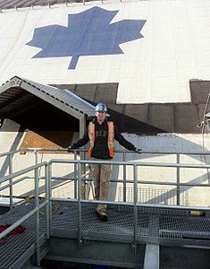 A Member works on and arena in Toronto.