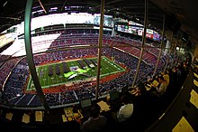 US Navy 031230-N-6213R-502 The U.S. Naval Academy Brigade of Midshipmen marches onto the field as seen from the press box in the EV1.Net Houston Bowl at Reliant Stadium in Houston, Texas.jpg