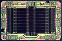 Die of an Altera EPM7032 EEPROM-based Complex Programmable Logic Device (CPLD). Die size 3446x2252 um. Technology node 1 um. Altera-epm7032-HD.jpg