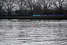 The Cambridge boat leads the Oxford boat