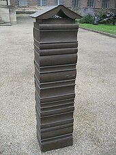 Bronze book bollard by Harry Gray in front of Library Bronze book bollards in front of Cambridge University Library.jpg