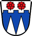 Gemeinde Rehling Unter viermal unten gezinntem silbernem Schildhaupt, darin zwei nebeneinander stehende rote heraldische Rosen, in Blau nebeneinander zwei gekürzte silberne Spitzen.