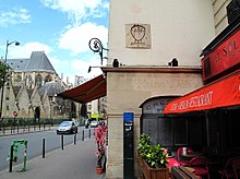A sundial painted by Dali, 27 Rue Saint-Jacques, Paris Dali Sundial in Paris.jpg