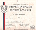 Un diplôme certifiant l’attribution de la médaille, en 1953.