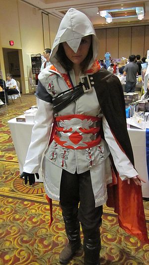 A cosplayer portraying Ezio from Assassin's Cr...