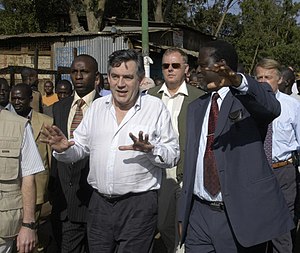 Gordon Brown touring the slums of Nairobi, Ken...