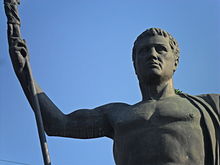 Close up shot of a statue of the bare chested Pergamum king Attalus II holding a kind of spear